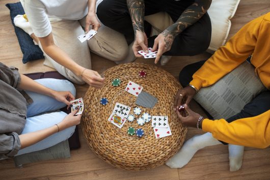 friends-havinf-fun-while-playing-poker-1