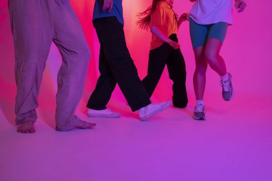 low-angle-people-dancing-studio