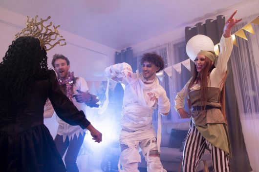 people-having-fun-costumes-party