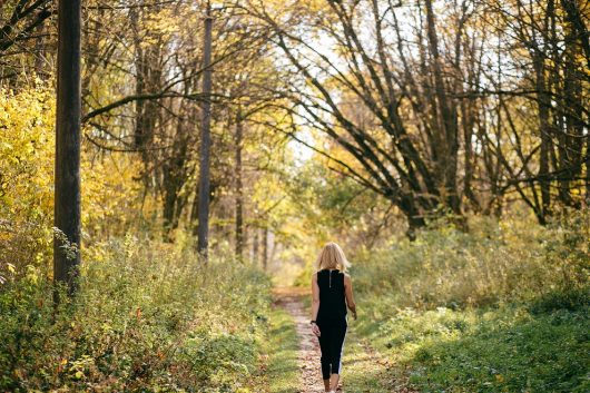 young-girl-walking-autumn-park